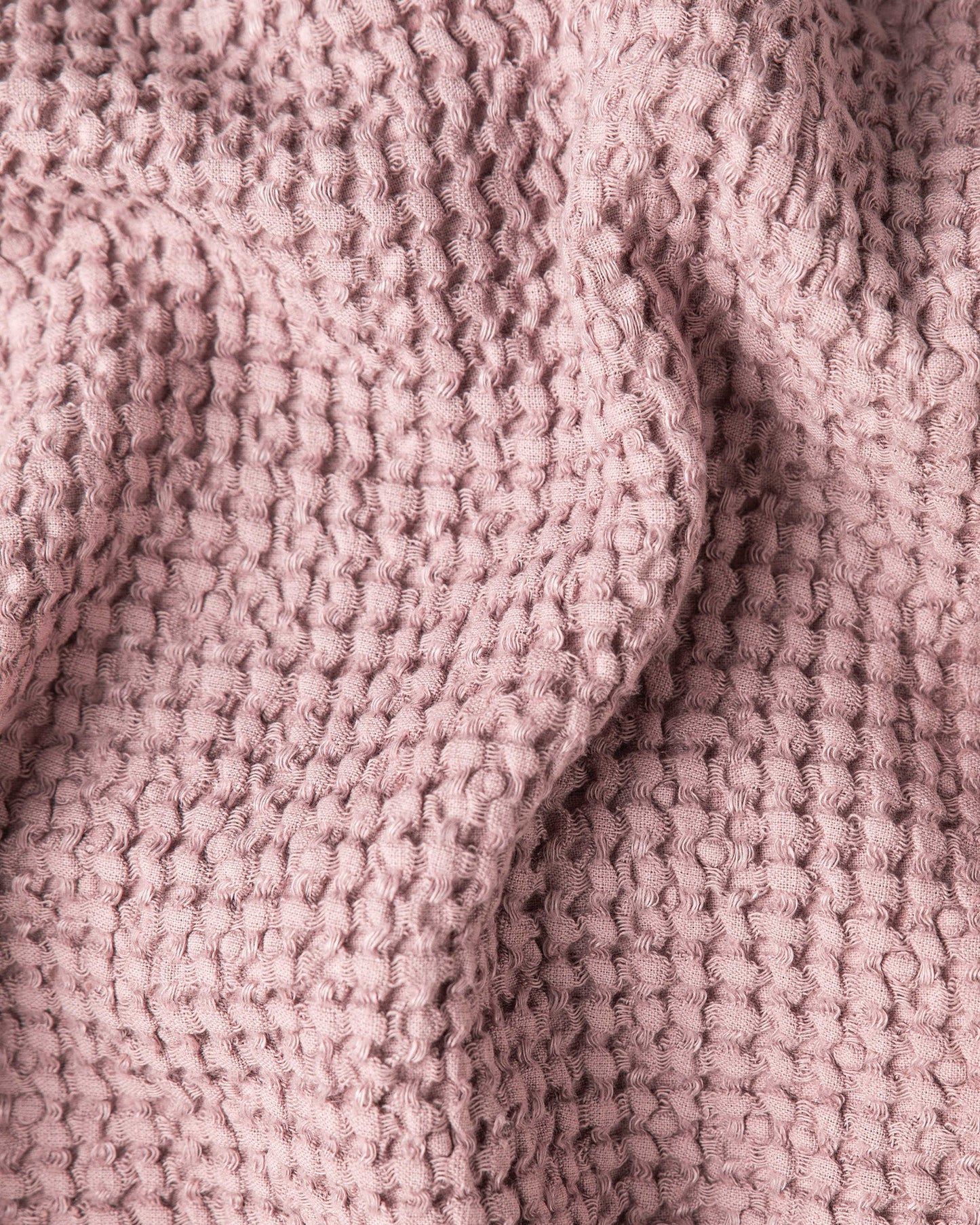 Waffle linen couch cover in Woodrose