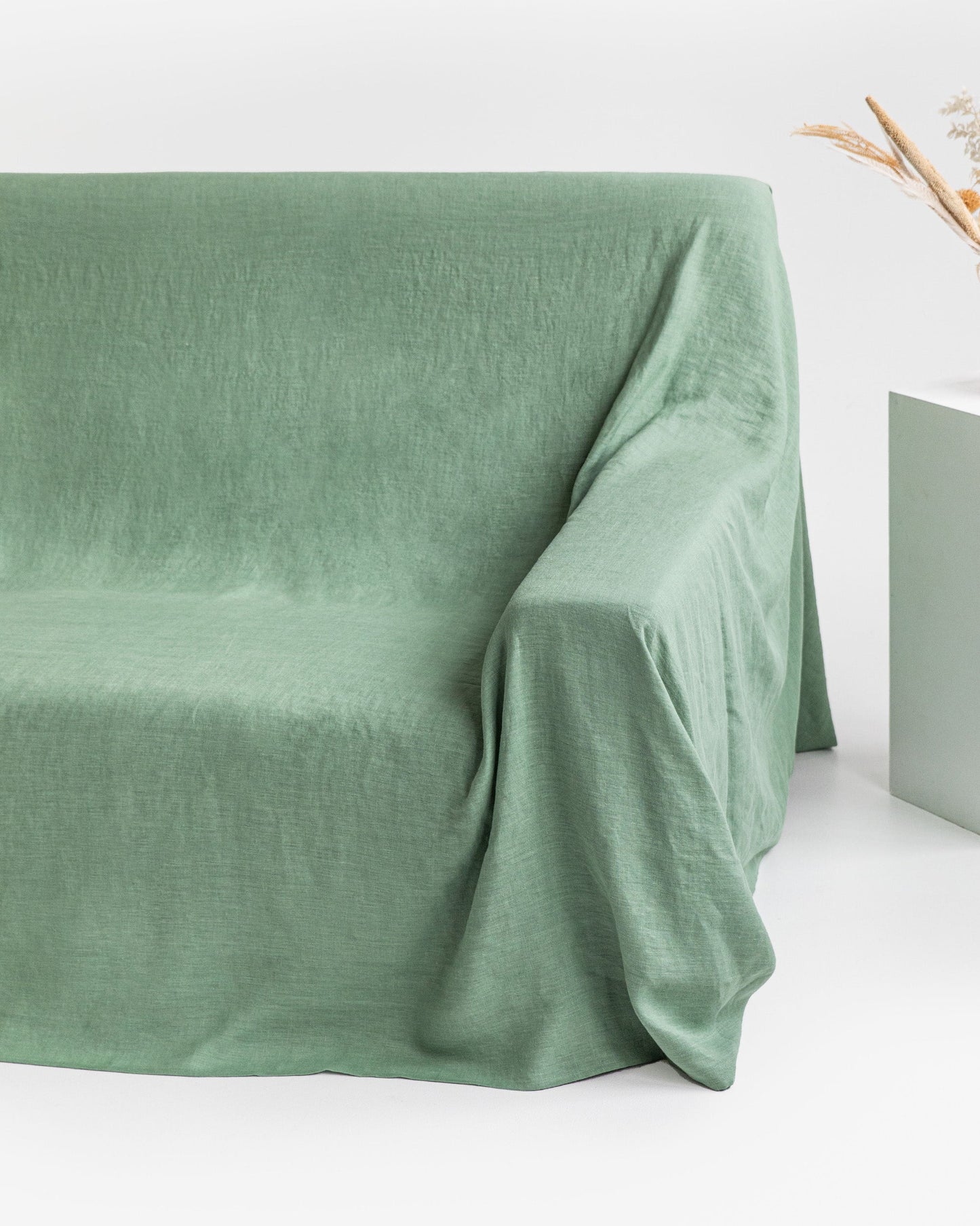 Linen couch cover in Matcha green